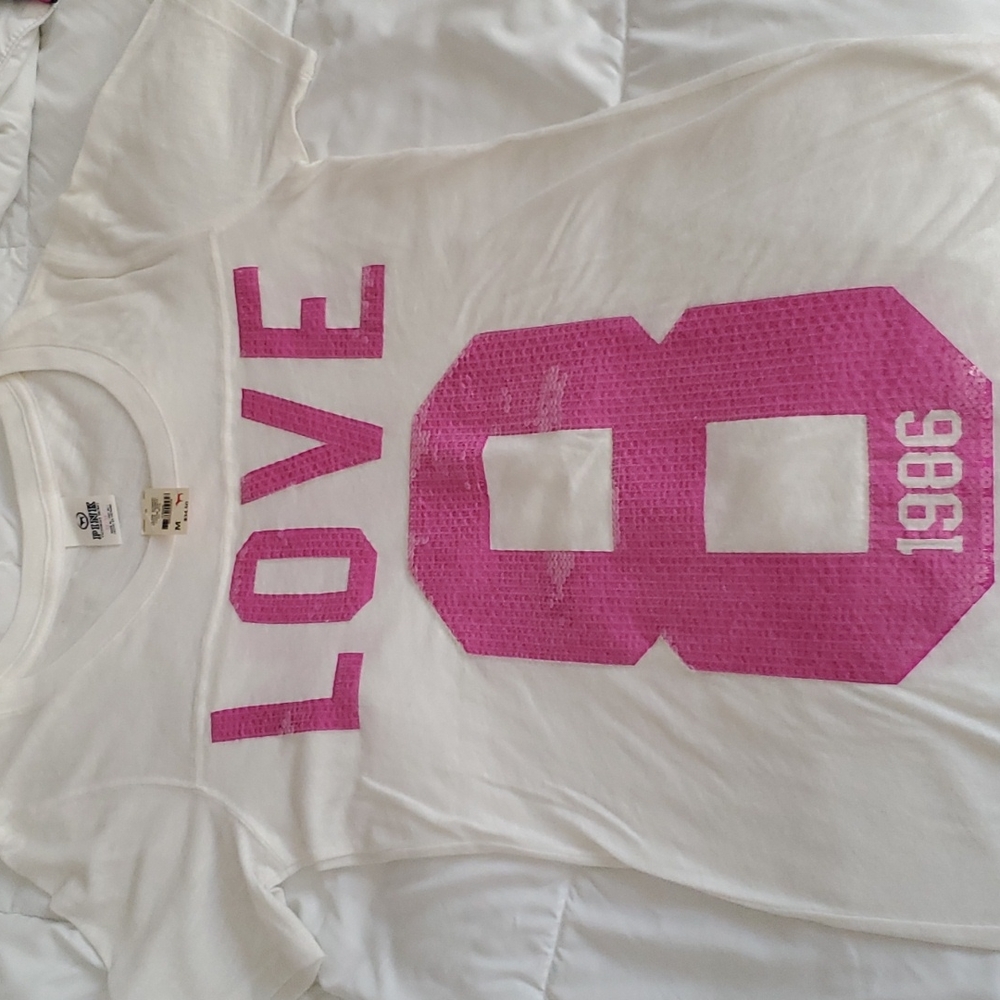 Pink, new, size medium shirt